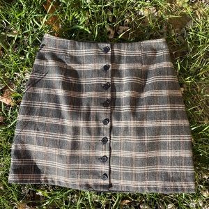 Plaid mini skirt black buttons up the front